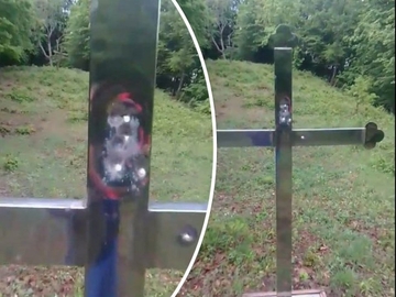Pucano na pravoslavni krst i groblje u Travniku